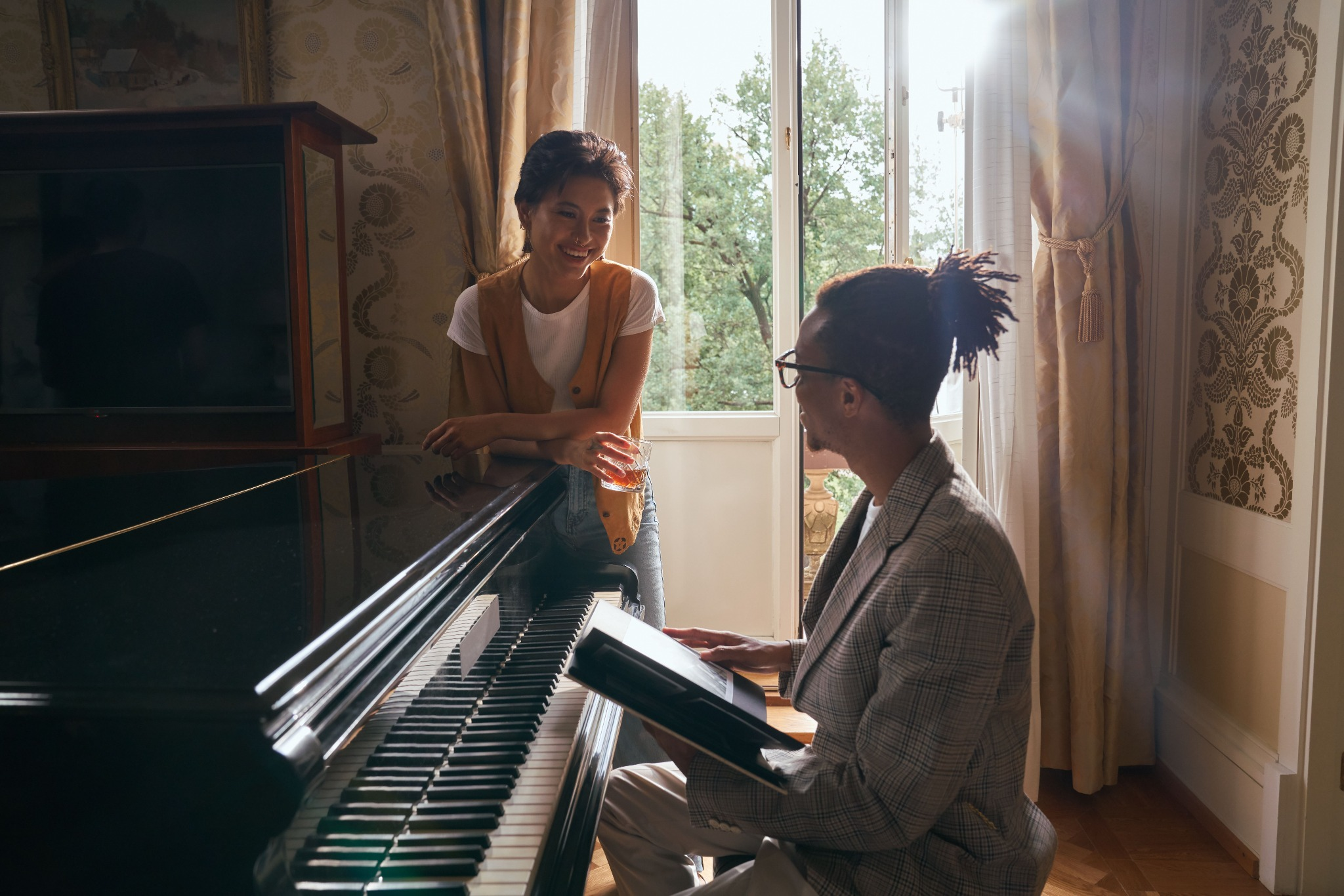Two musicians at a grand piano
